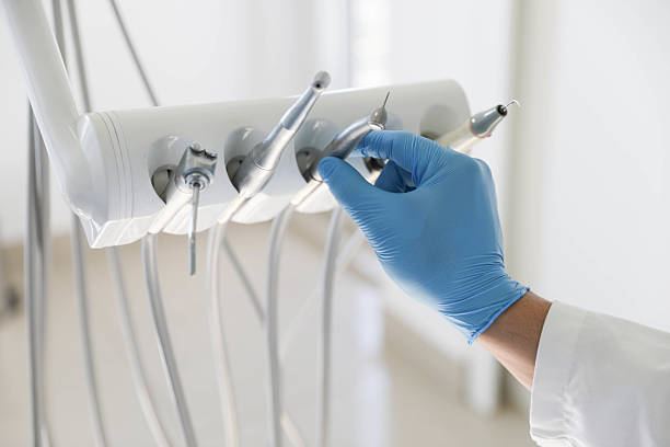 Professional Tooth Extraction technician working in Browns Lake, WI